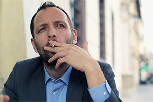 Businessman Smoking a Cigarette